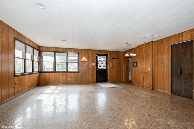 7745 S Kilpatrick Ave, Chicago, IL 60652 - foyer entrance with wooden walls and baseboards