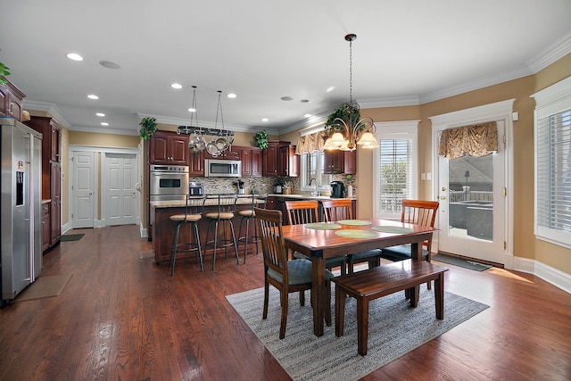 22388 Crimson Ln, Frankfort, IL 60423 - dining area with a chandelier, recessed lighting, dark wood-style flooring, crown molding, and baseboards