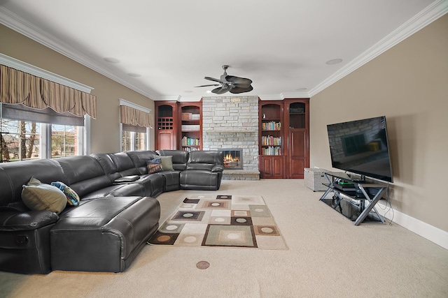 22388 Crimson Ln, Frankfort, IL 60423 - living area featuring crown molding, ceiling fan, a fireplace, carpet flooring, and baseboards