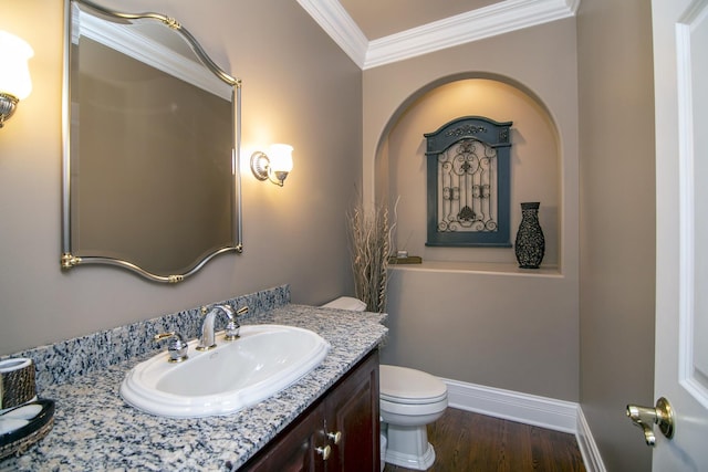 22388 Crimson Ln, Frankfort, IL 60423 - bathroom with ornamental molding, toilet, vanity, wood finished floors, and baseboards