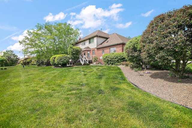 22388 Crimson Ln, Frankfort, IL 60423 - traditional-style home with brick siding, a chimney, and a front lawn