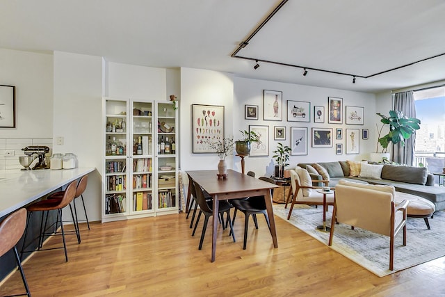 330 N Jefferson St Unit 903, Chicago, IL 60661 - living area featuring light wood finished floors and rail lighting