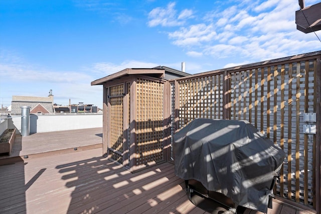 513 N Claremont Ave Unit 3S, Chicago, IL 60612 - wooden terrace with area for grilling