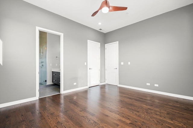 513 N Claremont Ave Unit 3S, Chicago, IL 60612 - unfurnished bedroom with wood finished floors, baseboards, a ceiling fan, and ensuite bathroom
