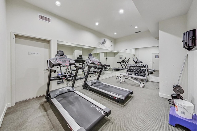 gym featuring carpet floors, recessed lighting, and baseboards