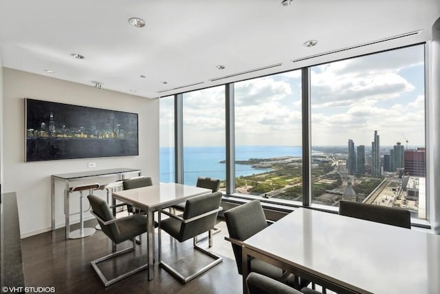 60 E Monroe St Unit 2607, Chicago, IL 60603 - dining area featuring plenty of natural light, dark wood finished floors, recessed lighting, floor to ceiling windows, and baseboards