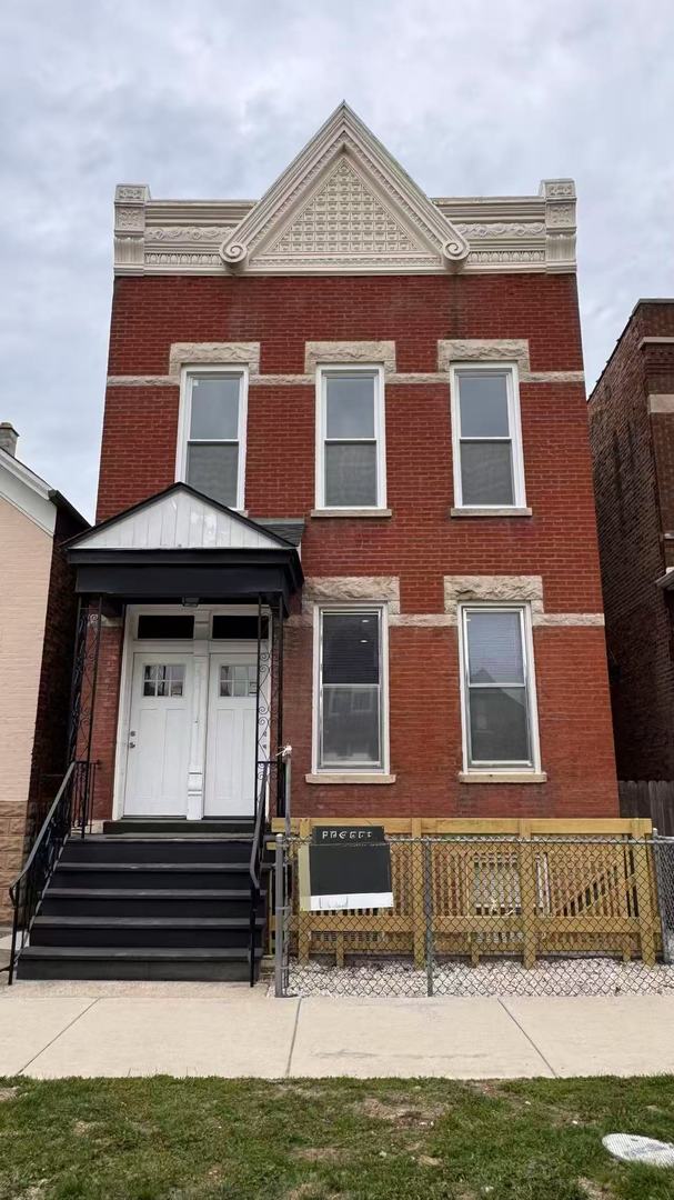 3621 S Winchester Ave, Chicago, IL 60609 - view of front of home with brick siding and fence