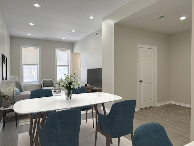 3621 S Winchester Ave, Chicago, IL 60609 - dining area featuring recessed lighting, light wood finished floors, and baseboards