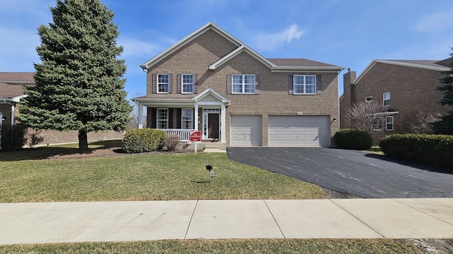 20161 Preston Ln, Lynwood, IL 60411 - traditional-style home with an attached garage, a porch, driveway, brick siding, and a front yard