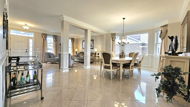 20161 Preston Ln, Lynwood, IL 60411 - dining area featuring a decorative wall, ornamental molding, wainscoting, a chandelier, and light tile patterned floors