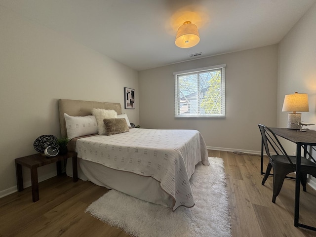 5024 W 122nd St Unit 2B, Alsip, IL 60803 - bedroom with wood finished floors and baseboards