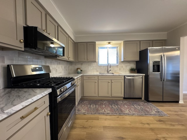5024 W 122nd St Unit 2B, Alsip, IL 60803 - kitchen with stainless steel appliances, crown molding, light wood-style floors, tasteful backsplash, and light stone counters