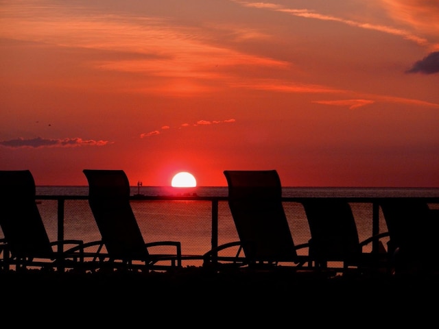 patio terrace at dusk with a water view