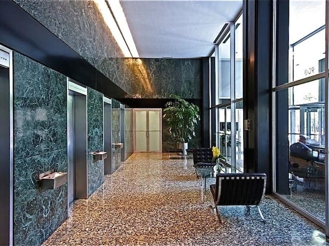 lobby with floor to ceiling windows