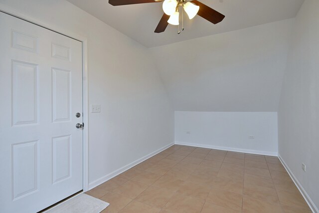 5104 N Austin Ave, Chicago, IL 60630 - additional living space featuring vaulted ceiling, ceiling fan, and baseboards