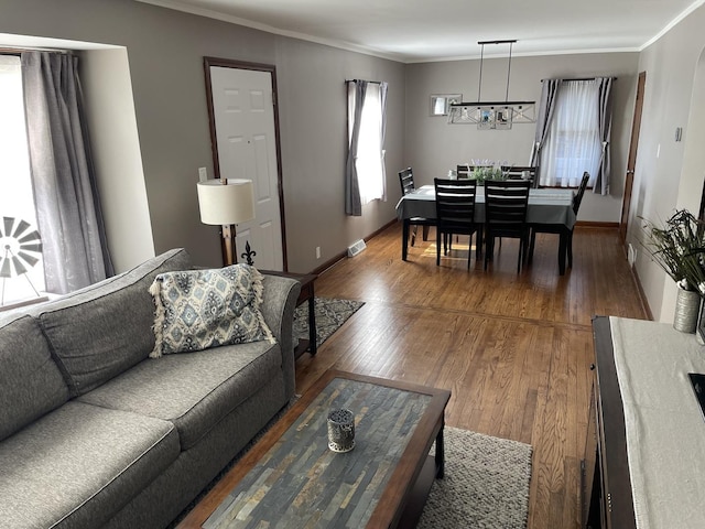 3254 W 115th St, Chicago, IL 60655 - living area featuring wood finished floors, ornamental molding, and baseboards