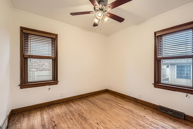 3254 W 115th St, Chicago, IL 60655 - spare room featuring healthy amount of natural light, light wood finished floors, crown molding, ceiling fan, and baseboards