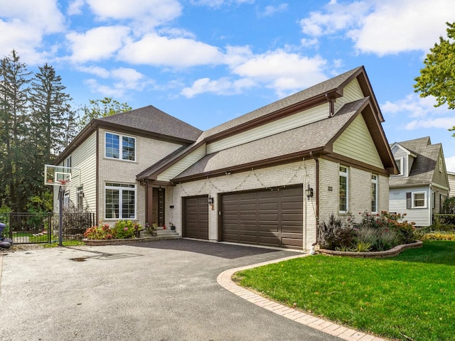 1327 Greenwood Ave, Deerfield, IL 60015 - view of front of home with driveway, an attached garage, brick siding, and a shingled roof
