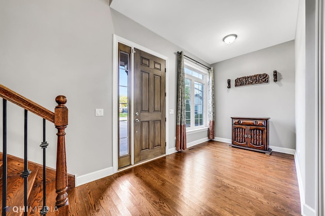 1327 Greenwood Ave, Deerfield, IL 60015 - foyer featuring wood finished floors, stairs, and baseboards
