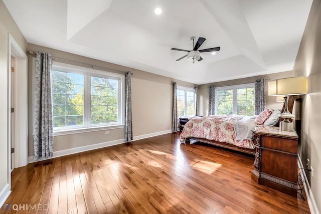 1327 Greenwood Ave, Deerfield, IL 60015 - bedroom featuring baseboards, wood-type flooring, a raised ceiling, ceiling fan, and recessed lighting