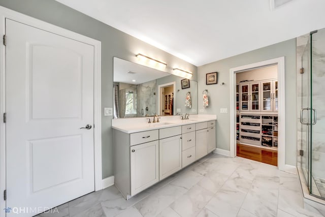 1327 Greenwood Ave, Deerfield, IL 60015 - full bath with marble finish floors, a stall shower, double vanity, and baseboards