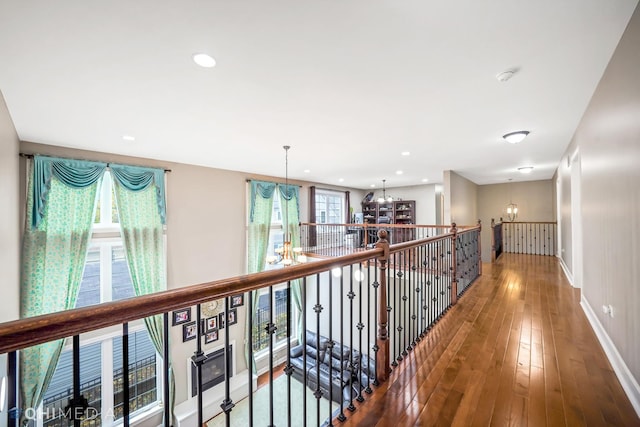 1327 Greenwood Ave, Deerfield, IL 60015 - hall with a chandelier, baseboards, wood-type flooring, an upstairs landing, and recessed lighting
