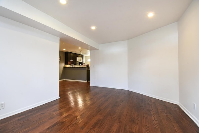 523 E 41st St, Chicago, IL 60653 - spare room with dark wood-type flooring, recessed lighting, and baseboards