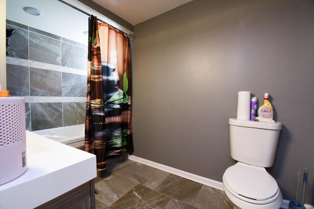 523 E 41st St, Chicago, IL 60653 - full bath with toilet, baseboards, vanity, and shower / bath combination with curtain