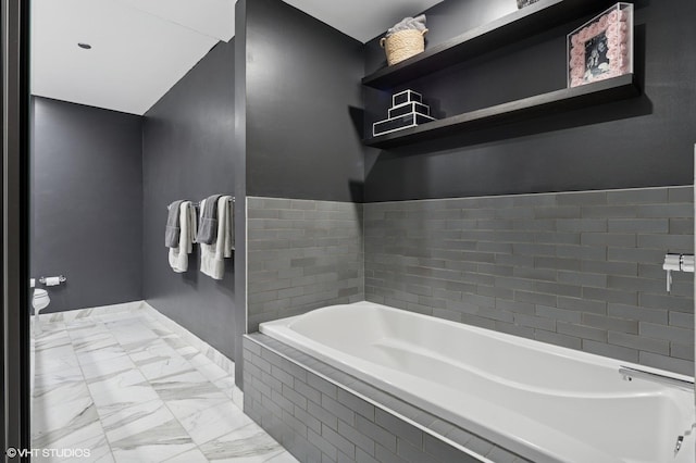 60 E Monroe St Unit 3308, Chicago, IL 60603 - full bath with a garden tub and marble look tiles