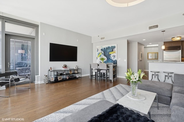 60 E Monroe St Unit 3308, Chicago, IL 60603 - living area with wood finished floors, baseboards, and recessed lighting