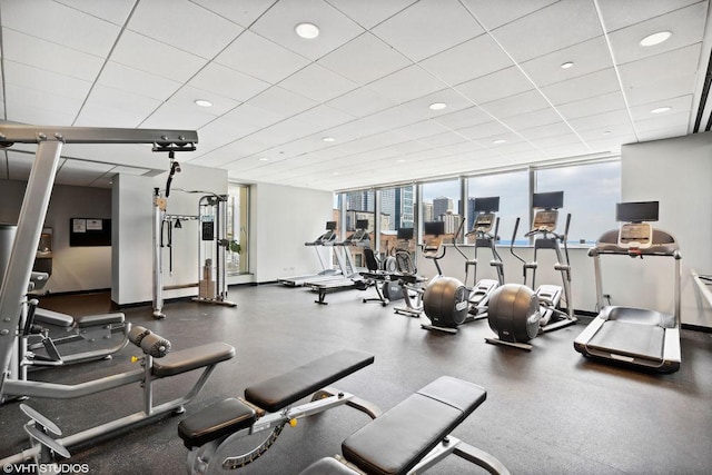 60 E Monroe St Unit 3308, Chicago, IL 60603 - workout area with a paneled ceiling, baseboards, and recessed lighting