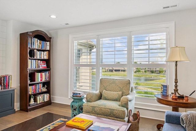 604 Cayman Way, Savoy, IL 61874 - living area with plenty of natural light, wood finished floors, and recessed lighting