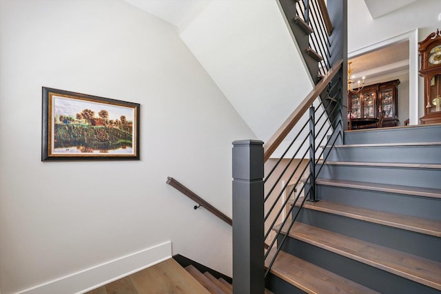 604 Cayman Way, Savoy, IL 61874 - staircase featuring wood finished floors and baseboards