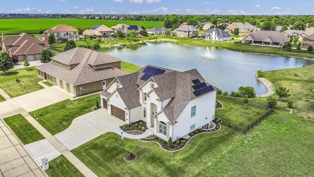 604 Cayman Way, Savoy, IL 61874 - aerial perspective of suburban area with a nearby body of water