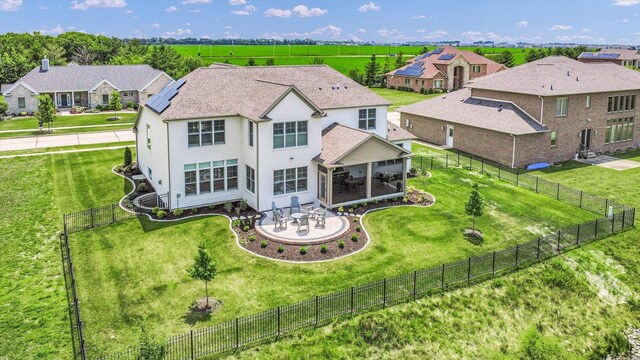 604 Cayman Way, Savoy, IL 61874 - back of property with a sunroom, a residential view, and a fenced backyard