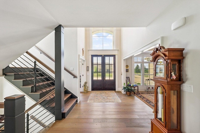 604 Cayman Way, Savoy, IL 61874 - entryway with hardwood / wood-style floors, french doors, and stairs