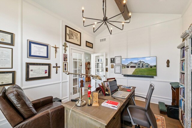 604 Cayman Way, Savoy, IL 61874 - office space featuring a decorative wall, french doors, a chandelier, and wood finished floors