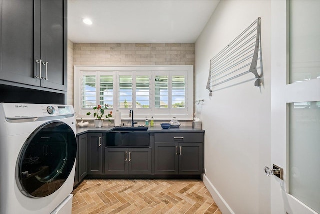 604 Cayman Way, Savoy, IL 61874 - washroom featuring washer / dryer and cabinet space
