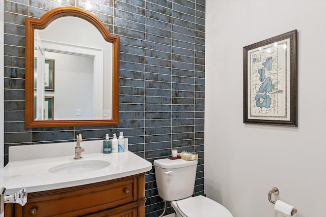 604 Cayman Way, Savoy, IL 61874 - half bathroom with vanity and tile walls