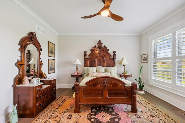 604 Cayman Way, Savoy, IL 61874 - bedroom with wood finished floors, ornamental molding, and a ceiling fan