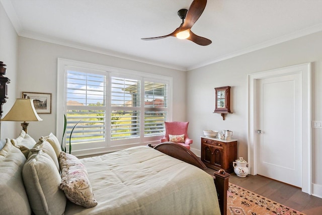 604 Cayman Way, Savoy, IL 61874 - bedroom featuring ornamental molding, wood finished floors, and ceiling fan