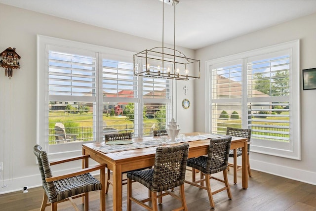 604 Cayman Way, Savoy, IL 61874 - dining space with a chandelier and wood finished floors