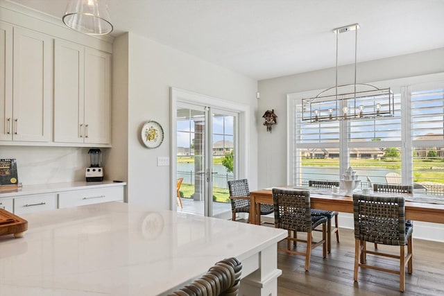 604 Cayman Way, Savoy, IL 61874 - dining space with wood finished floors