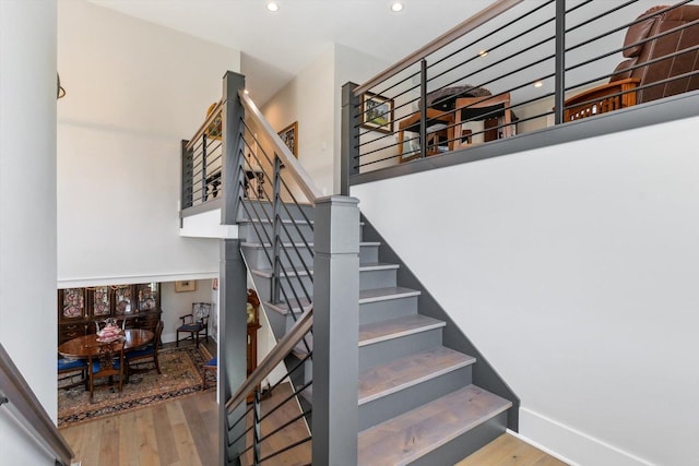 604 Cayman Way, Savoy, IL 61874 - stairway featuring wood finished floors and recessed lighting