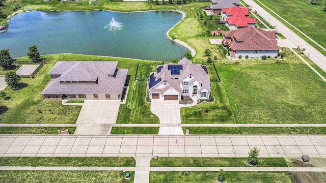 604 Cayman Way, Savoy, IL 61874 - aerial perspective of suburban area featuring a nearby body of water