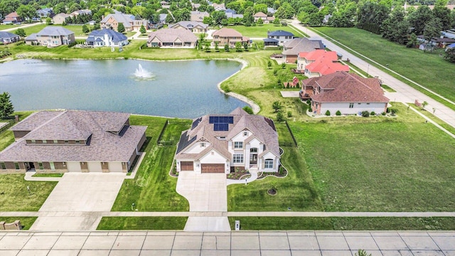 604 Cayman Way, Savoy, IL 61874 - aerial perspective of suburban area with a large body of water