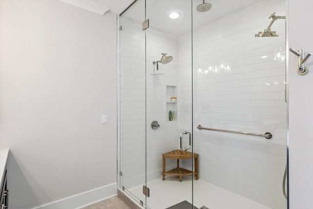604 Cayman Way, Savoy, IL 61874 - bathroom with a shower stall and baseboards