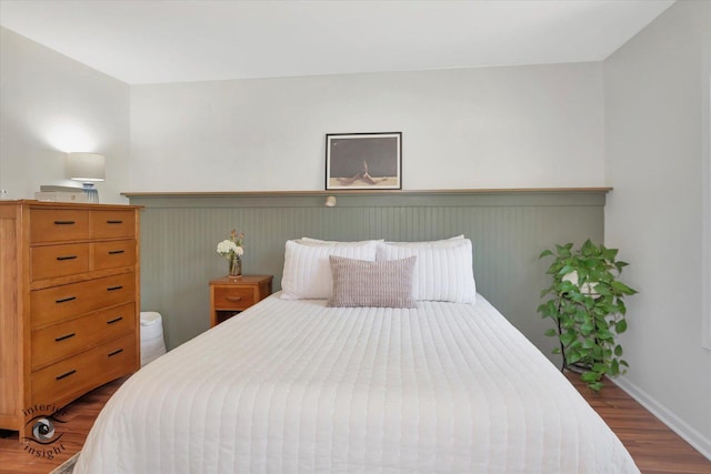 1525 Raymond Dr Unit 103, Naperville, IL 60563 - bedroom with wood finished floors, wainscoting, and baseboards