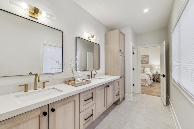 828 E Franklin Ave, Naperville, IL 60540 - ensuite bathroom featuring double vanity, recessed lighting, and baseboards