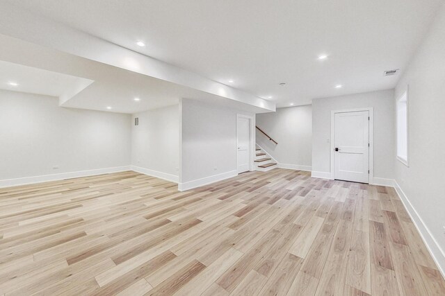 828 E Franklin Ave, Naperville, IL 60540 - finished below grade area featuring stairway, light wood-style floors, recessed lighting, and baseboards